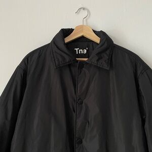 TNA Coaches black long jacket